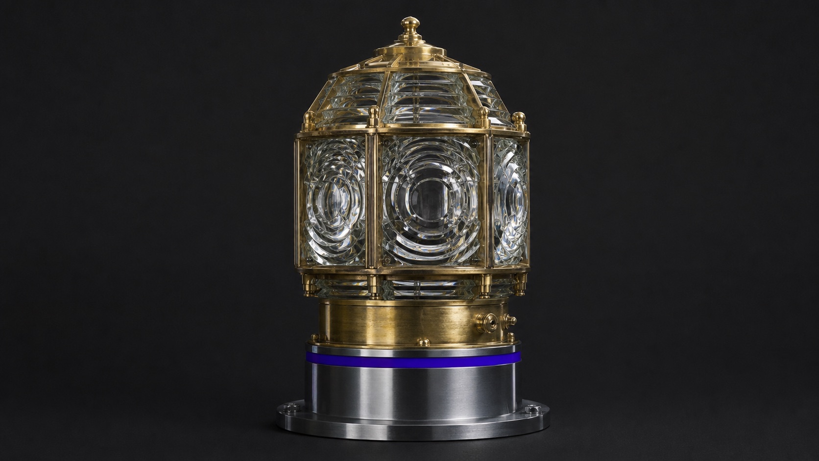 A vintage brass-and-glass lighthouse Fresnel lens beacon