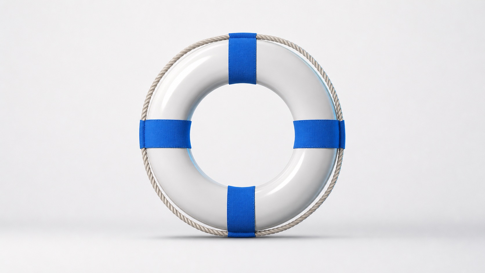 A classic white ship's life ring (lifebuoy) with rope grab lines